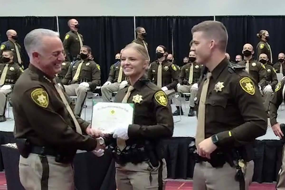 Clark County Sheriff Joe Lombardo, left, congratulates one of the 81 Las Vegas Metropolitan Pol ...
