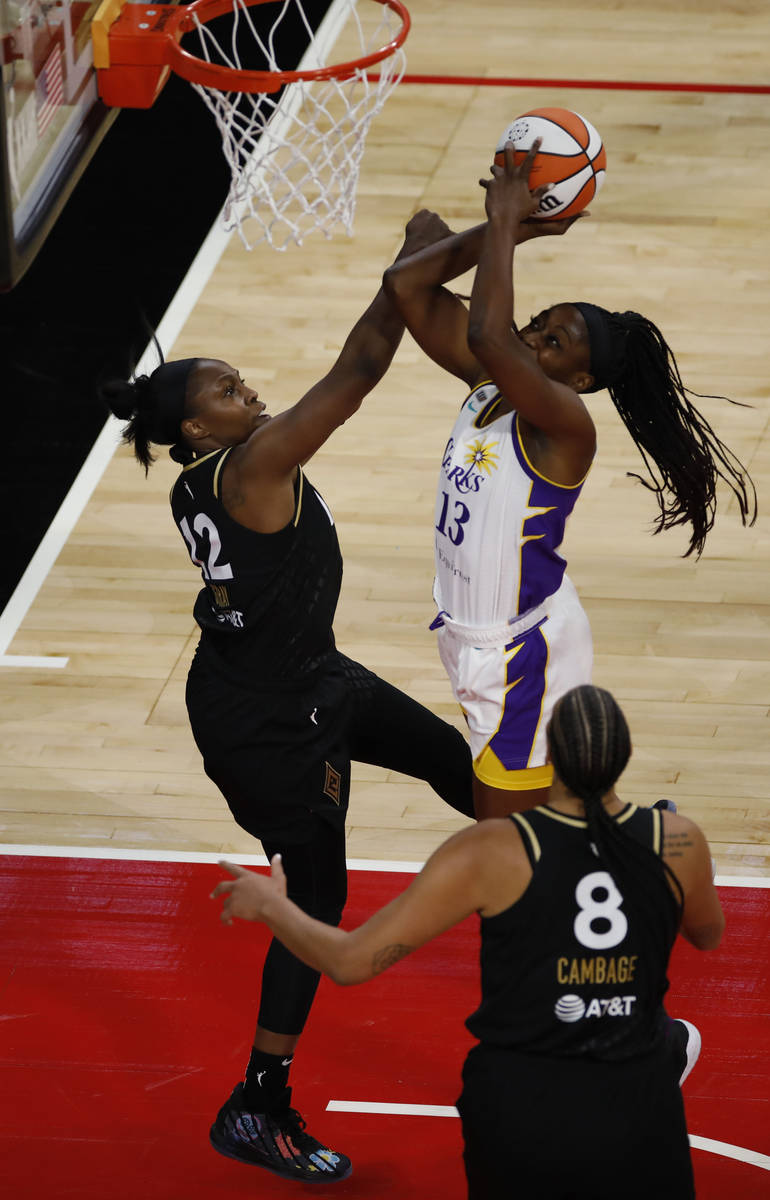 Los Angeles Sparks forward/center Chiney Ogwumike (13) shoots over Las Vegas Aces guard Chelsea ...