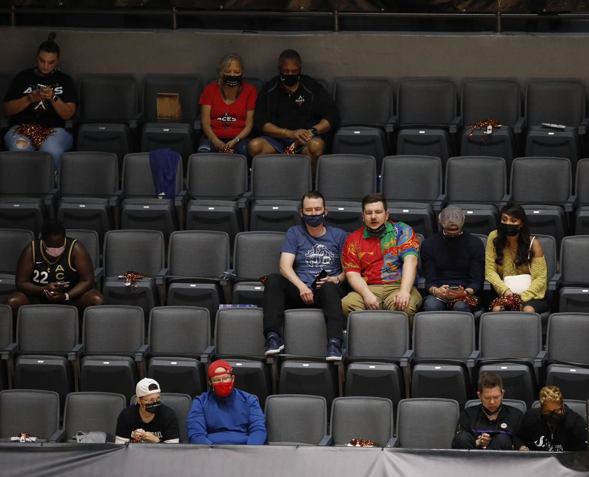 Fans watch the second quarter of a WNBA basketball game in Las Vegas, Friday, May 21, 2021. (Ch ...