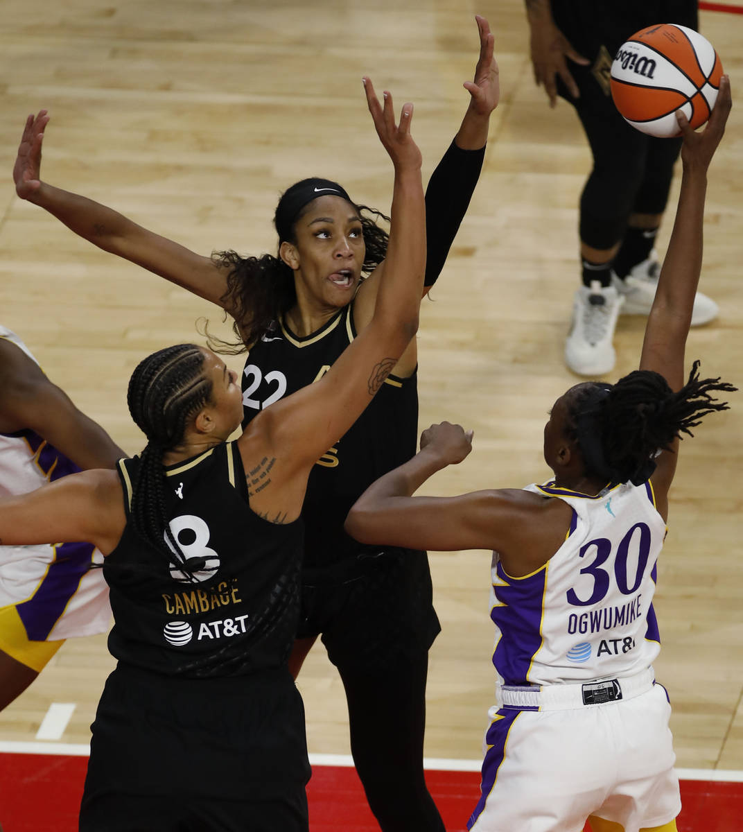 Los Angeles Sparks forward Nneka Ogwumike (30) looks to pass against Las Vegas Aces forward A'j ...