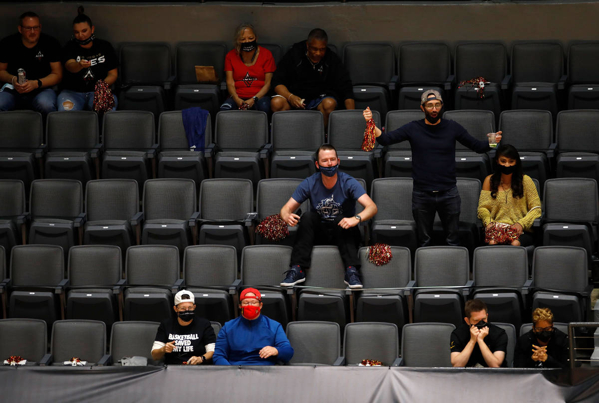 Fans watch the third quarter of a WNBA basketball game in Las Vegas, Friday, May 21, 2021. (Chi ...