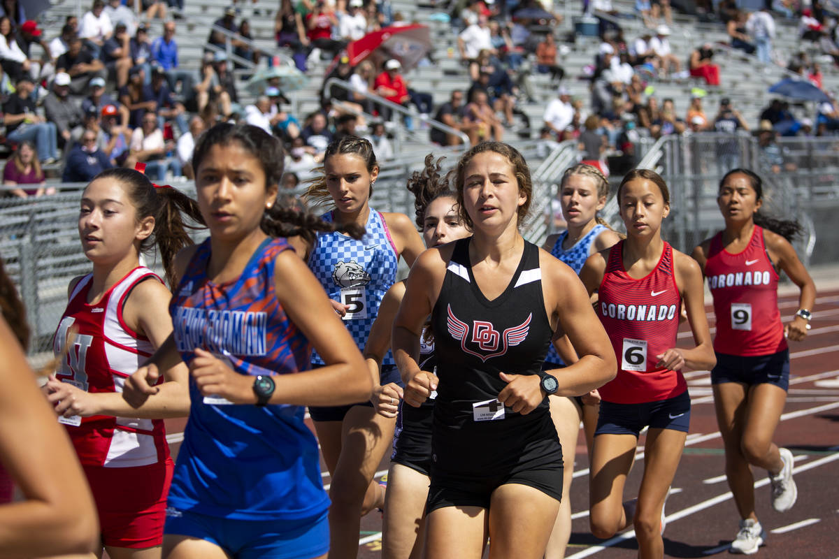 Runners compete in the girls 1600 meter race during the class 5A Southern Region boys and girls ...