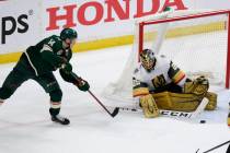 Vegas Golden Knights goaltender Marc-Andre Fleury (29) stops Minnesota Wild center Joel Eriksso ...