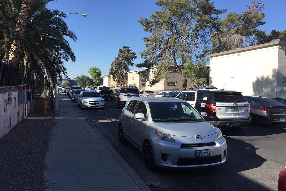 Police investigate a homicide Sunday, May 23, 2021, on the 3800 block of Royal Crest Street in ...