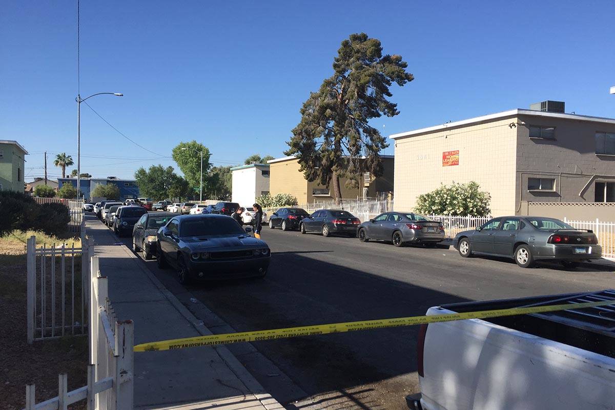 Police investigate a homicide Sunday, May 23, 2021, on the 3800 block of Royal Crest Street in ...