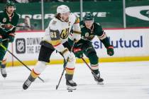 Vegas Golden Knights right wing Mark Stone (61) passes against Minnesota Wild center Joel Eriks ...