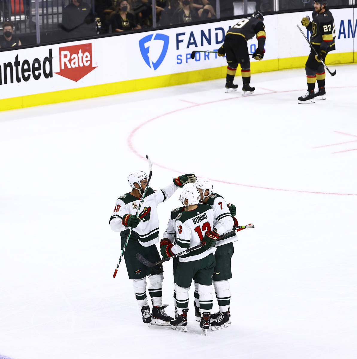 The Minnesota Wild celebrate an empty net goal against the Golden Knights during the third peri ...