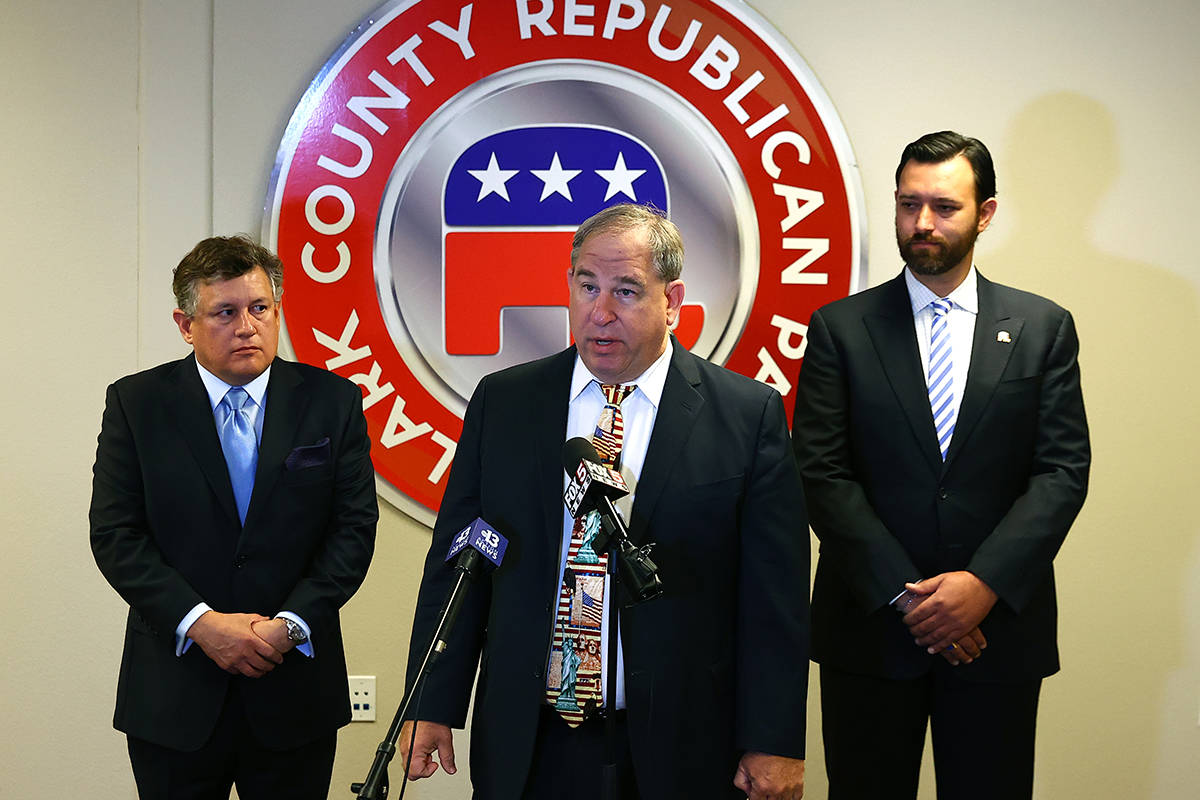 Clark County Republican Party Chairman David Sajdak, center, speaks during a press conference a ...