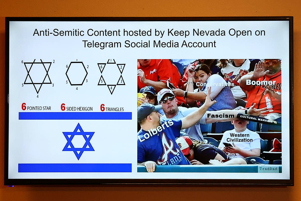 A video of Anti-Semitic content hosted by Keep Nevada Open on social media is played during a p ...