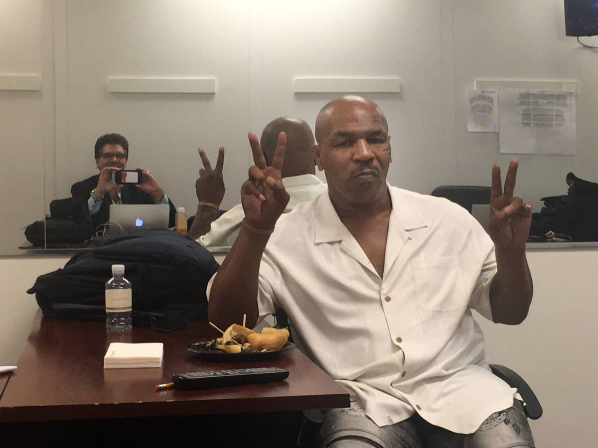 Mike Tyson is shown backstage at a KATS! Bureau backstage at The Venetian Theatre during " ...