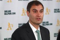 FILE - Oakland Athletics President Dave Kaval, center, speaks beside Oakland Mayor Libby Schaaf ...