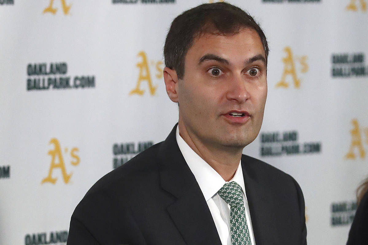 FILE - Oakland Athletics President Dave Kaval, center, speaks beside Oakland Mayor Libby Schaaf ...