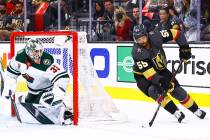 Golden Knights' Keegan Kolesar (55) skates with the puck as Minnesota Wild goaltender Cam Talbo ...