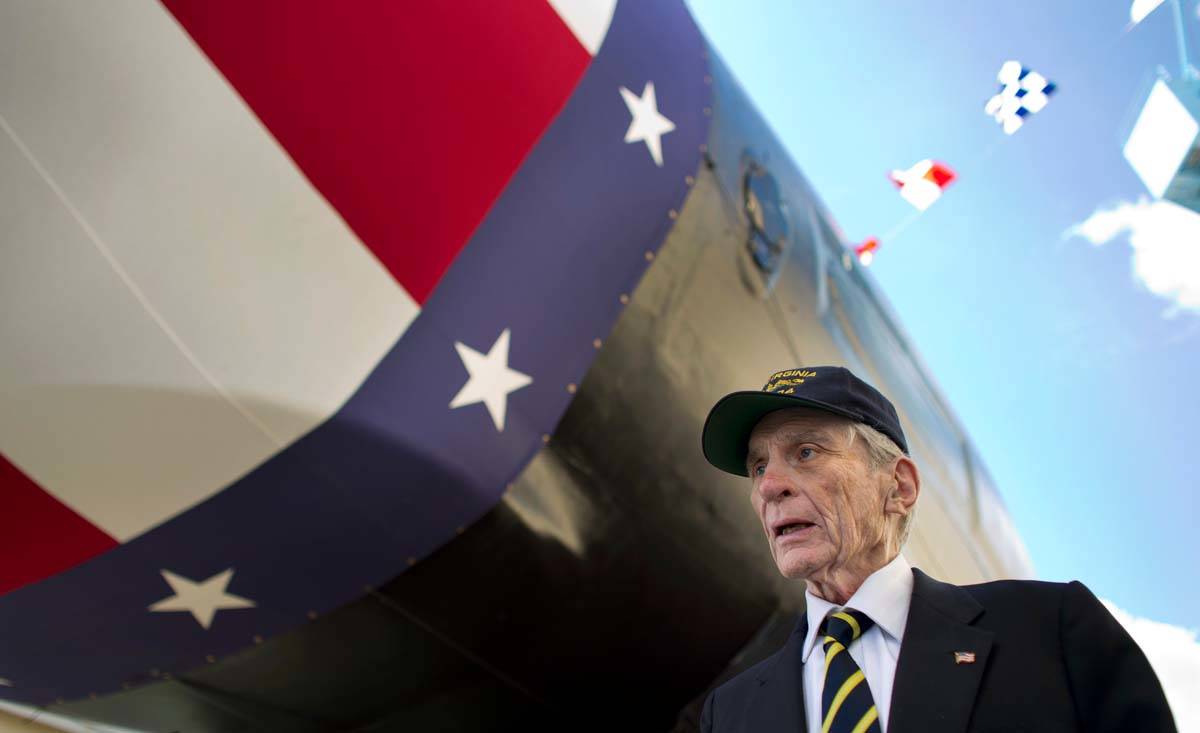 In this Sept. 6, 2014 file photo former Sen. John Warner of Virginia tours the new submarine th ...