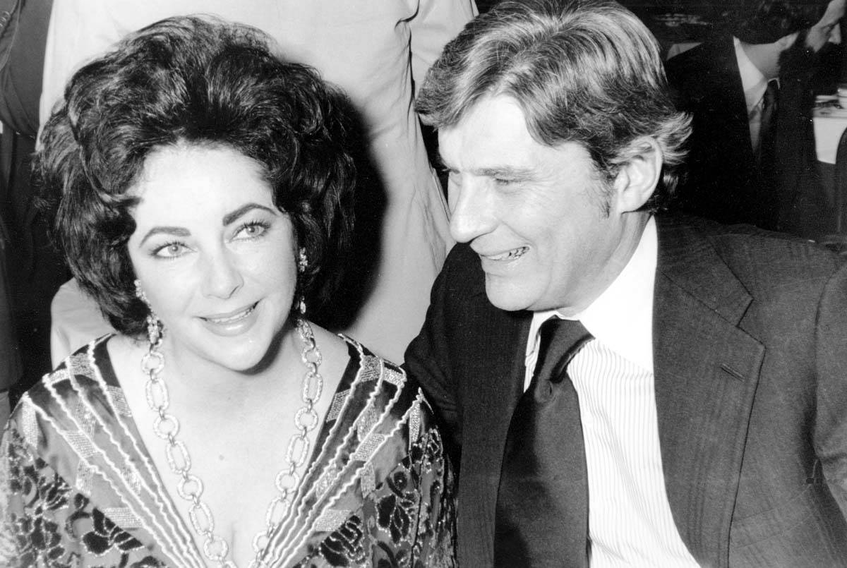 In this Jan. 30, 1977 file photo actress Elizabeth Taylor and her husband, former secretary of ...