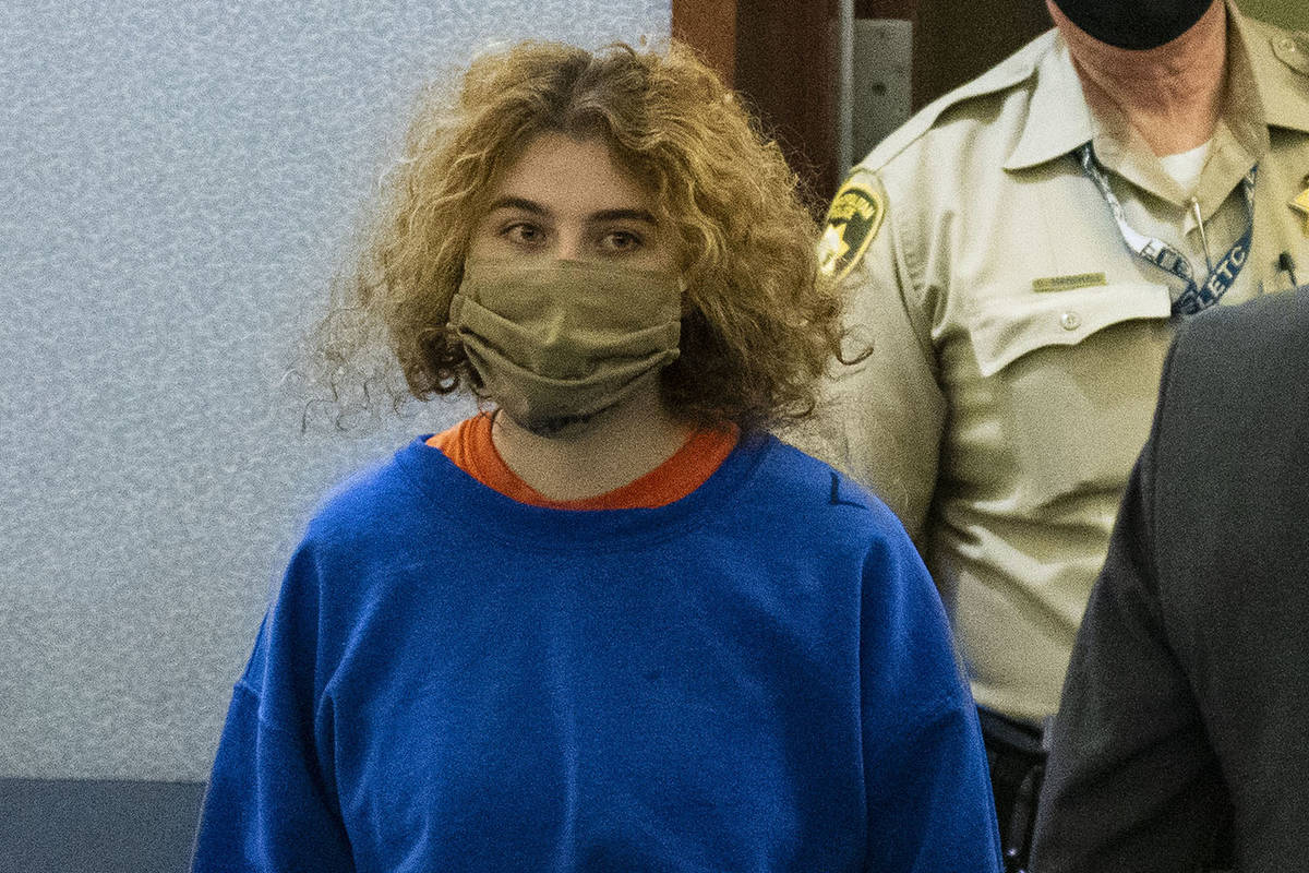 Sierra Halseth, charged in the killing of her father, Daniel, is led into the courtroom at the ...