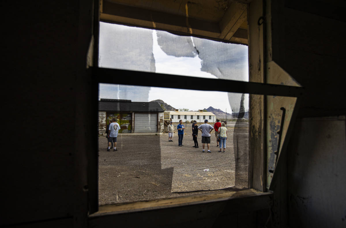 People walk around barracks during a tour of the Historic Wendover Airfield, a World War II-era ...