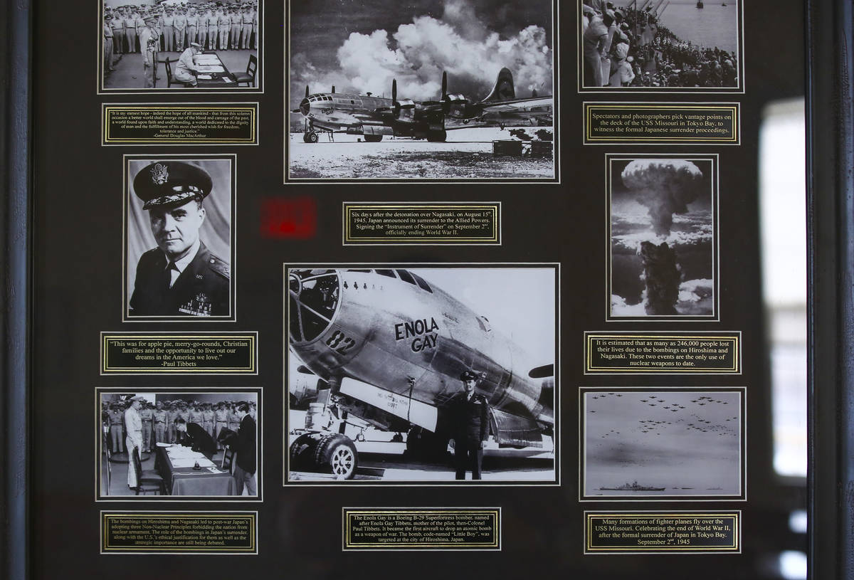 Historical photographs of then-Col. Paul Tibbets and Enola Gay during a tour of the Historic We ...