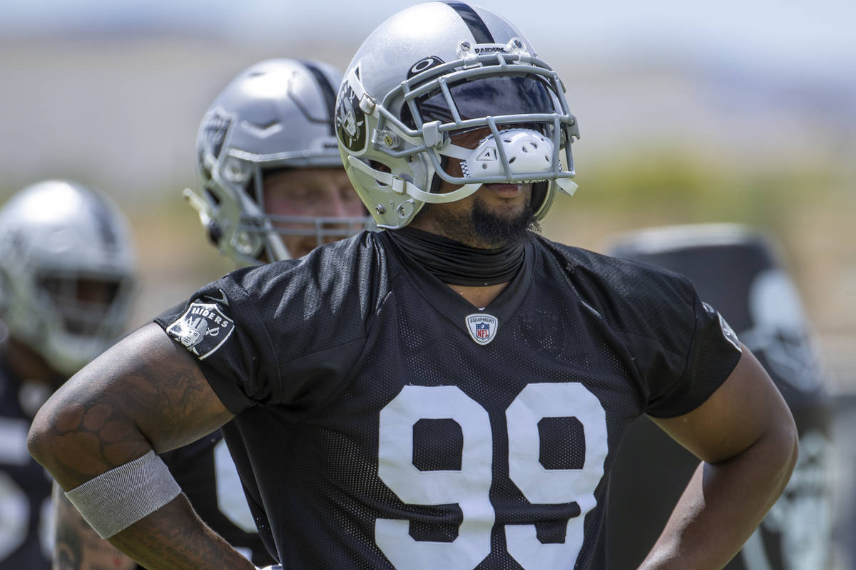 Defensive end Clelin Ferrell (99) grabs some air during a Las Vegas Raiders open practice at th ...