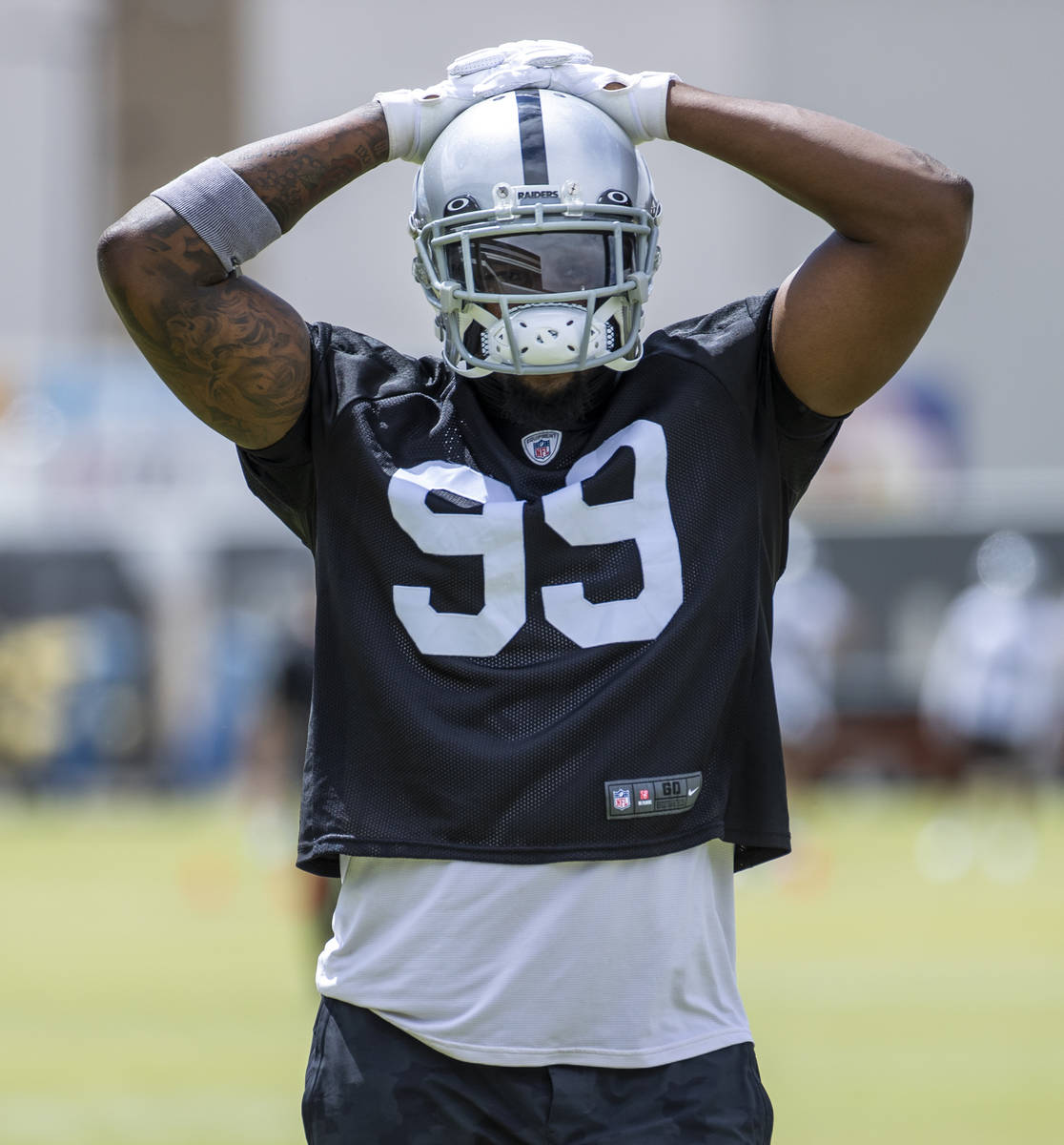 Defensive end Clelin Ferrell (99) grabs some air during a Las Vegas Raiders open practice at th ...
