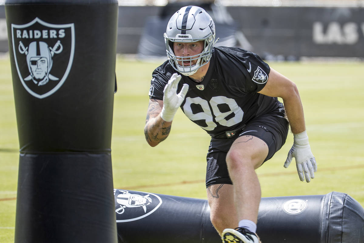 Defensive end Maxx Crosby (98) runs a drill during a Las Vegas Raiders open practice at the Int ...