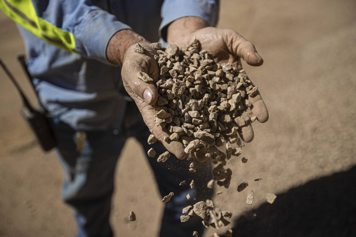 Robby Ruesch, manager of mining and delivery for Las Vegas-based company MP Materials, inspects ...