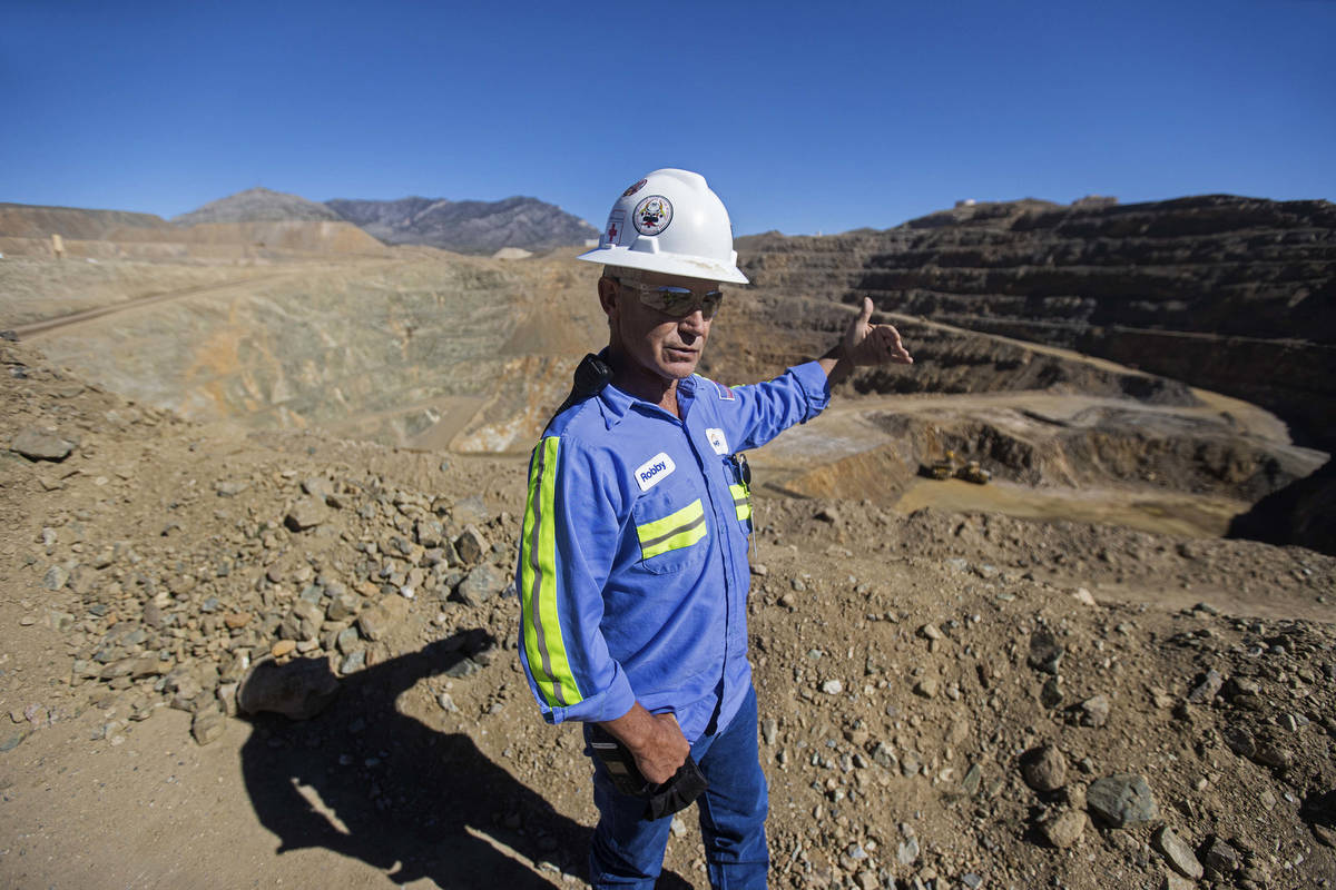 Robby Ruesch, manager of mining and delivery for Las Vegas-based company MP Materials, points o ...