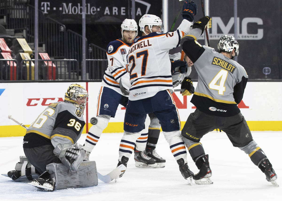 Henderson Silver Knights goaltender Logan Thompson (36) makes a save against Bakersfield Condor ...