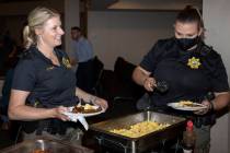 Metropolitan Police Department Sgt. Stephanie Ward, left, and officer T Dionisio are in the bre ...