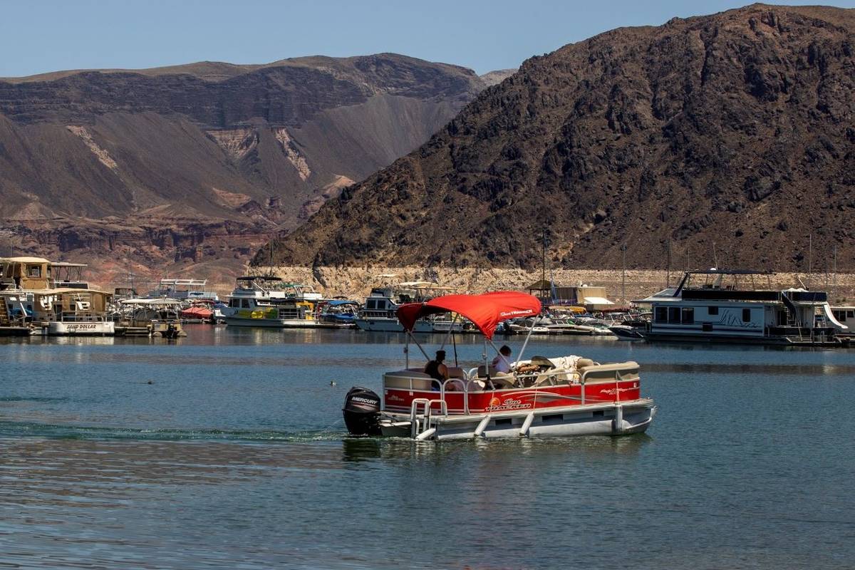 Boaters depart the Las Vegas Boat Harbor waters within the Lake Mead National Recreation Area o ...