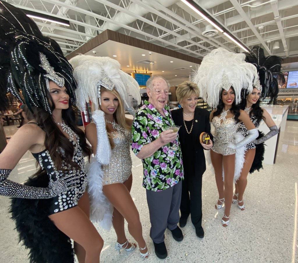 Oscar and Carolyn Goodman, along with the ZB Showgirls, are shown at the VIP preview of Bagelma ...