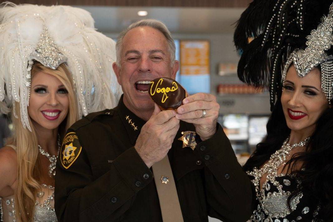 Clark County Sheriff Joe Lombardo poses with a “Vegas”-designed donut at the VIP preview of ...