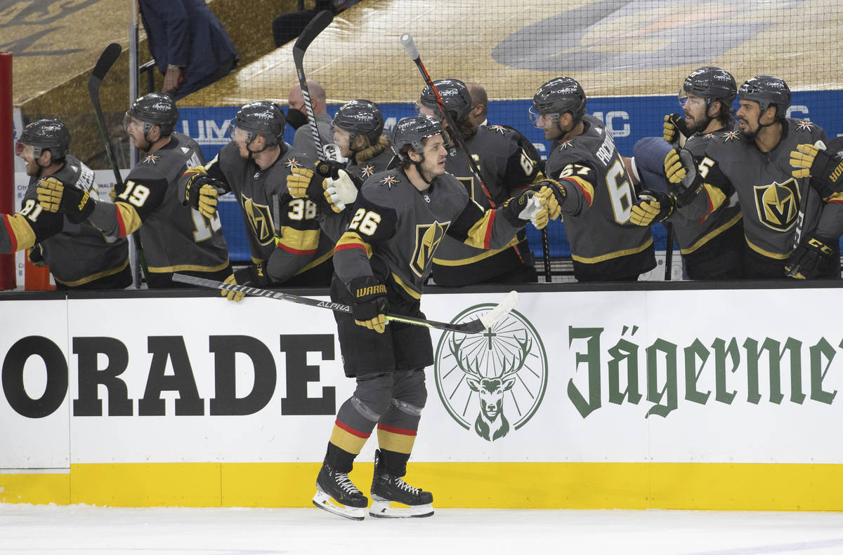 Vegas Golden Knights center Mattias Janmark (26) celebrates after scoring a goal during the fir ...