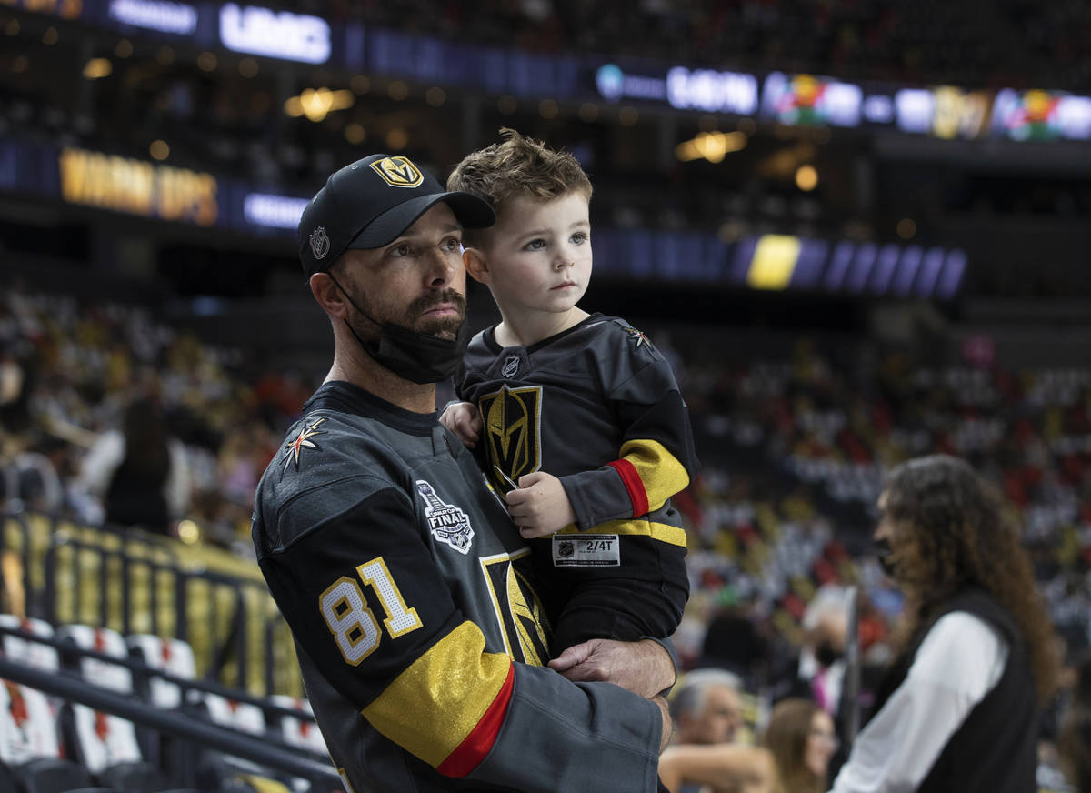 Golden Knights fans watch warmups before the start of Game 7 of the an NHL Stanley Cup first-ro ...