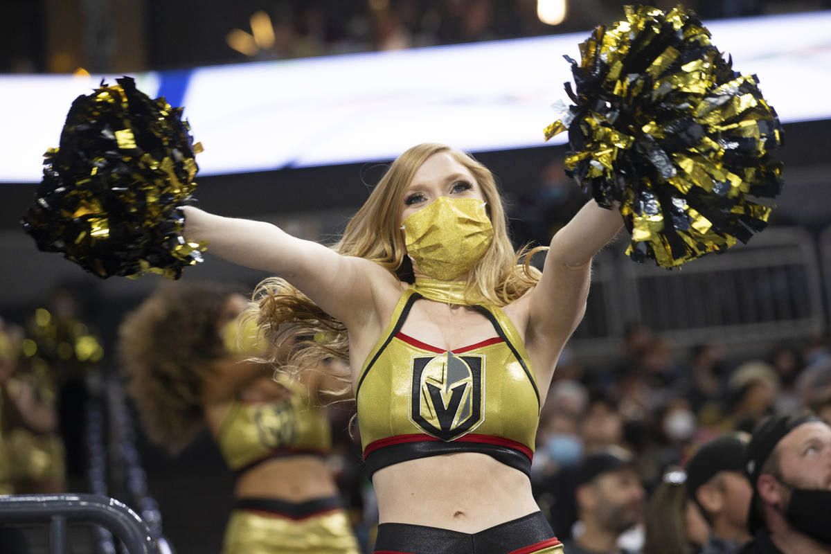 A Golden Aces cheerleader dances during the second period in game 7 of the an NHL Stanley Cup f ...