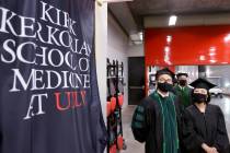 Toyokazu Endo and his mother Masae Endo before the graduation ceremony of medical doctor studen ...