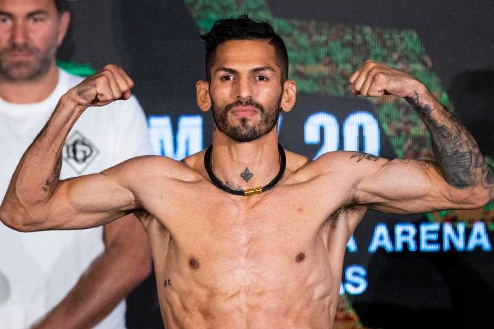 Jorge Linares stands on the scale during a weigh-in Friday, May 28, 2021, in Las Vegas. Linares ...