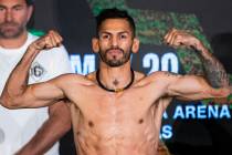 Jorge Linares stands on the scale during a weigh-in Friday, May 28, 2021, in Las Vegas. Linares ...