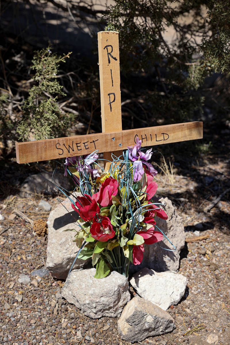 A makeshift memorial off Highway 160 in Mountain Springs near where the body of a young boy was ...