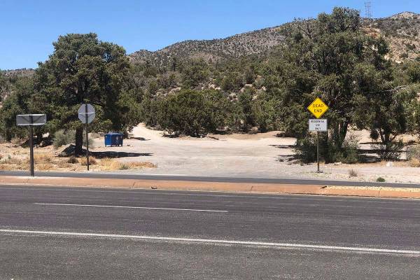 The body of a young boy was found behind a bush near a trail off state Route 160 between Las Ve ...