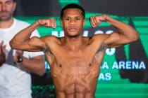 Devin Haney stands on the scale during a weigh-in Friday, May 28, 2021, in Las Vegas. Haney is ...