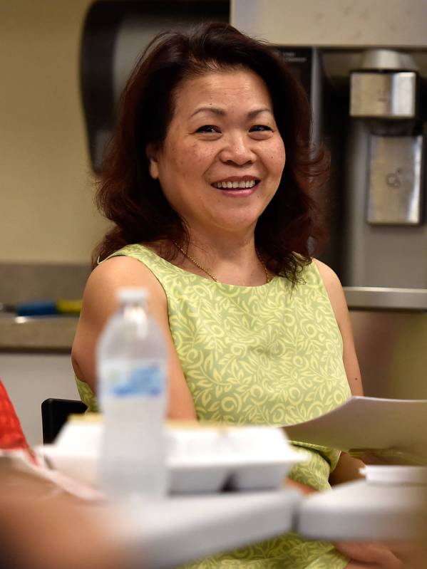 Vida Lin, president of the Asian Community Development Council attends a meeting of Asian group ...