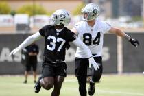 Las Vegas Raiders safety Tyree Gillespie (37) covers tight end Matt Bushman during a drill duri ...