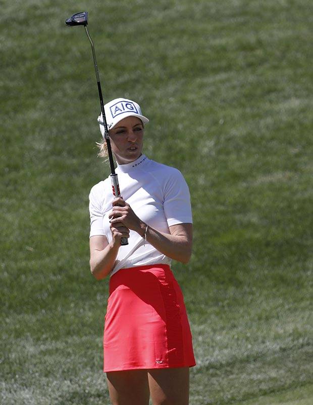 Sophia Popov of Germany reacts after her putt on the second green during the third round of th ...