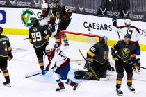 Colorado Avalanche's J.T. Compher (37) celebrates after scoring a goal past Golden Knights goal ...