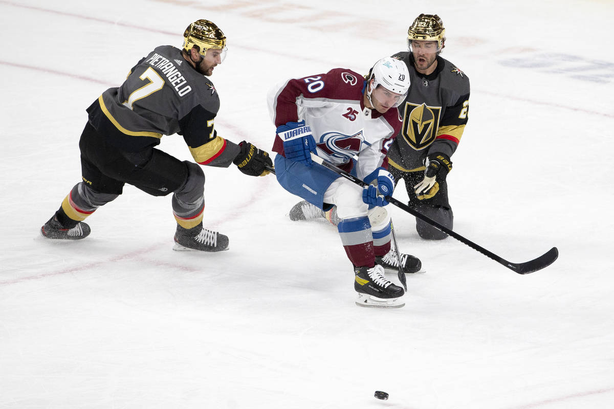 Golden Knights defenseman Alex Pietrangelo (7) and Colorado Avalanche right wing Logan O'Connor ...