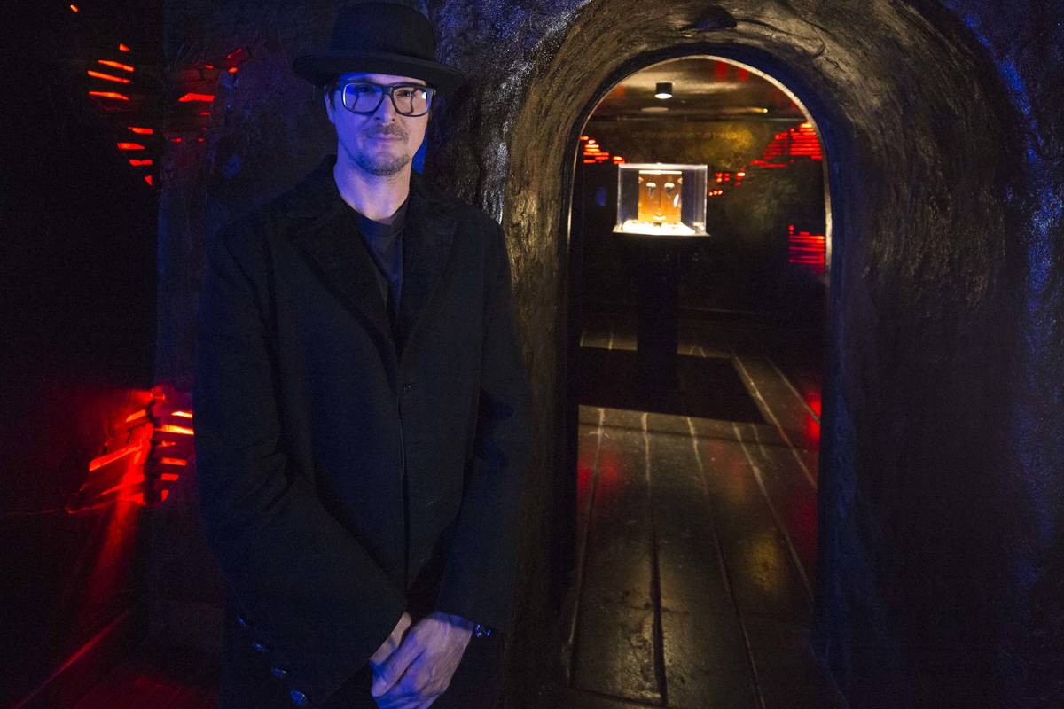 Ghost hunter Zak Bagans poses outside the room holding his Dybbuk Box, known as the world's mos ...