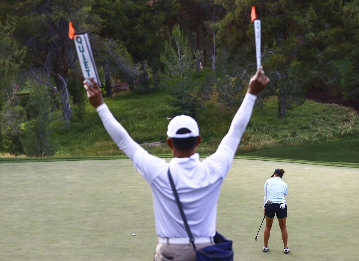 Ally Ewing putts at the 16th hole during the championship round of the Bank of Hope LPGA Match ...