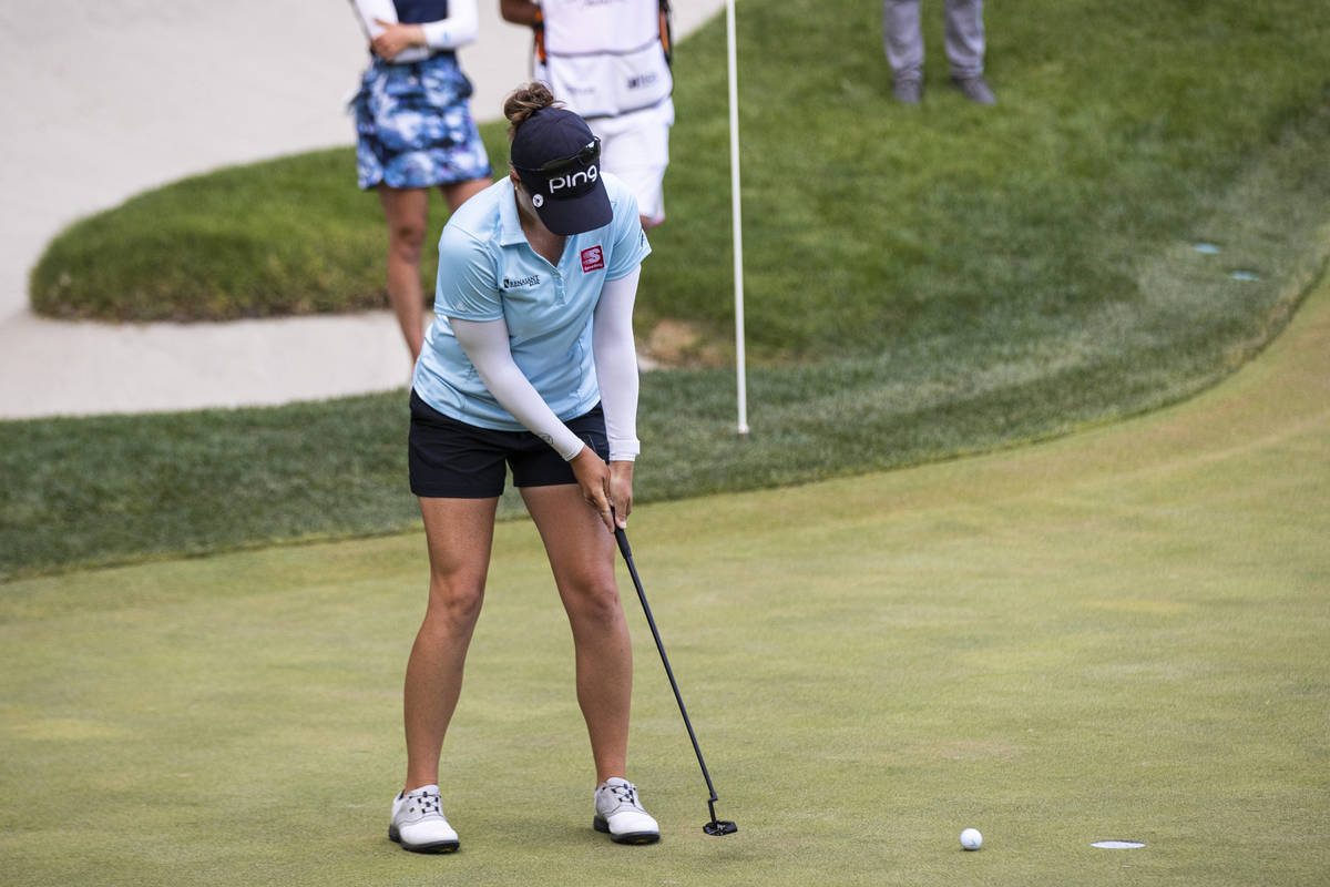 Ally Ewing sinks a putt shot at the 17th hole to win the championship round of the Bank of Hope ...