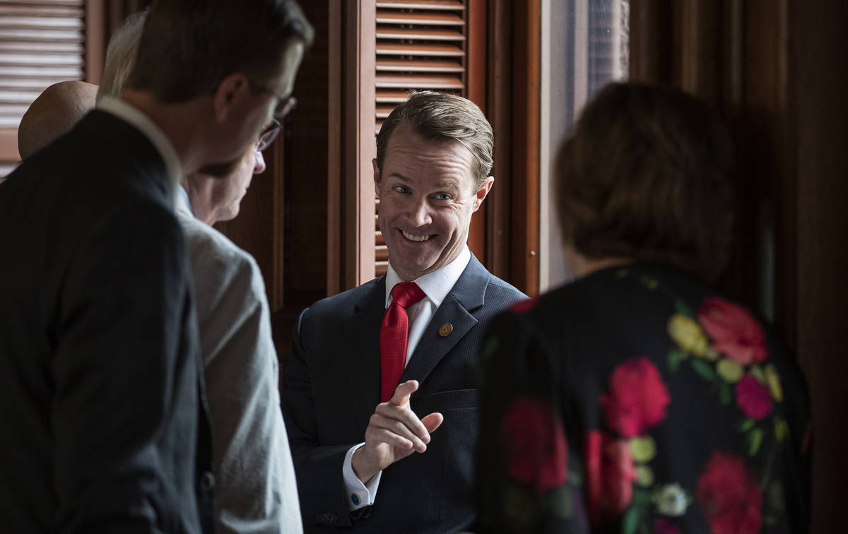 House Speaker Dade Phelan, R-Beaumont, talks to Republican members of the Texas House before th ...